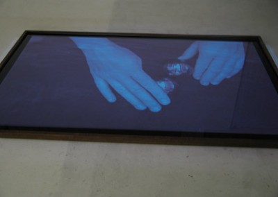 4) "attraction - repulsion", 2005, Ravensburger Kunstnacht, Wasserfläche (Folie, Metall, Wasser) 250 x 170 cm, vertikale Videoprojektion